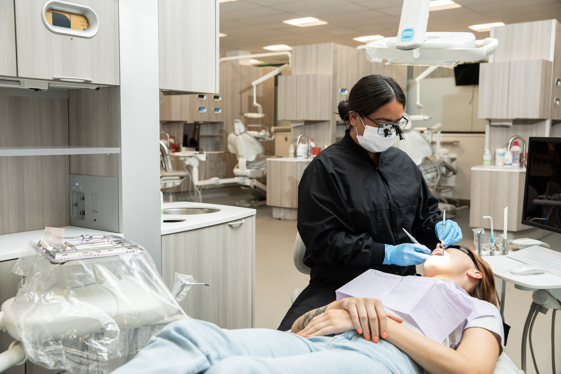 Dental hygiene student with patient