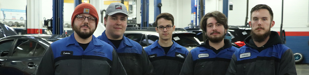 automotive students posing for camera