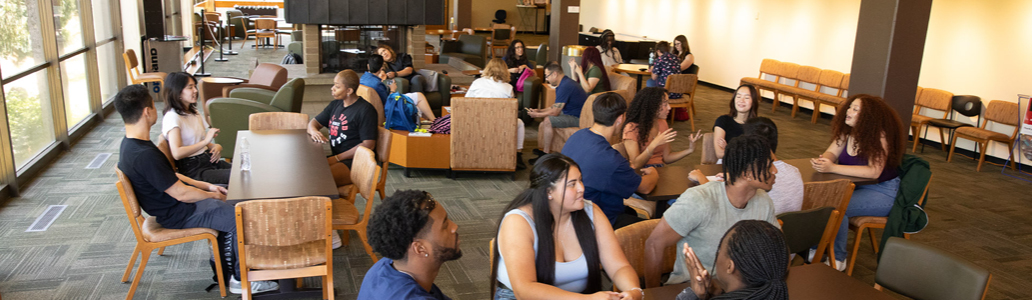 Students sitting in common area on campus